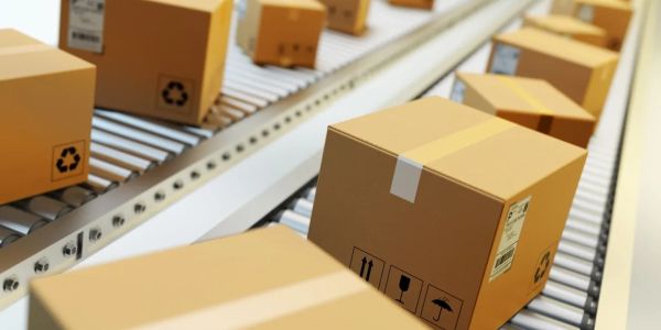 Cardboard boxes on a conveyor belt.