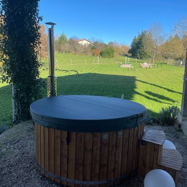 4 seater hot tub new for 2025 use included in the weekly price.