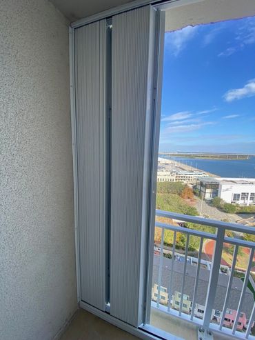 Condo building window protection, condo code upgrade, commercial condo shutters