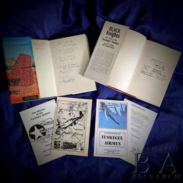 Signed copies of Tuskegee Airmen and Black Knights books autographed by original WWII pilots.
