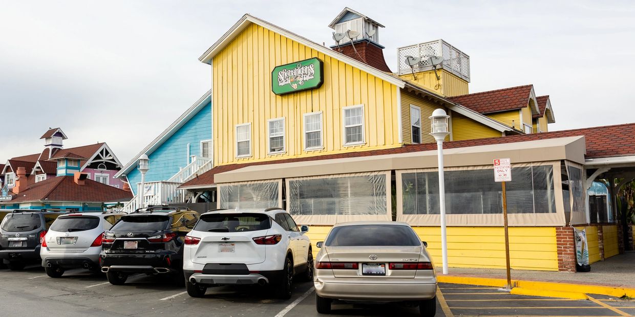 Cars parked outside the Shenanigans Irish Pub