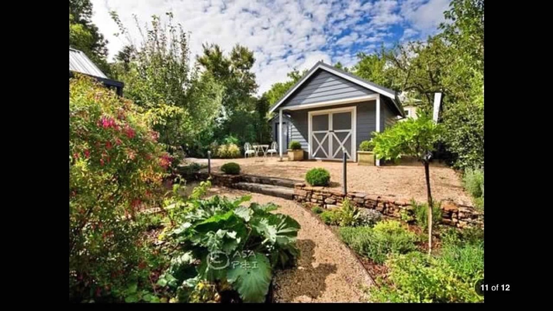 Here we designed and constructed a custom garden studio and all new beautifying landscaping.