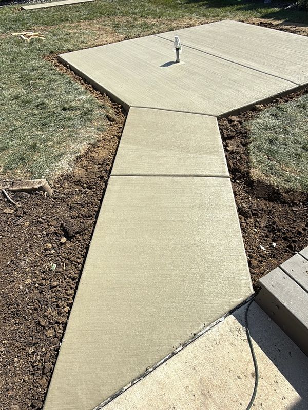 Concrete walkway with pad