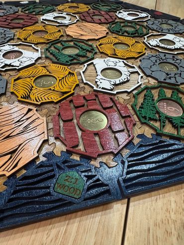 Custom wooden Catan board with engraved brass tokens