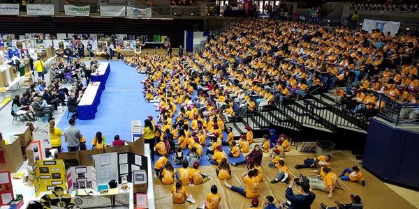 Students listening to speech.