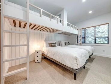 Custom bunk room construction in a full house renovation in Whistler, BC