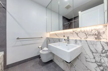 Bathroom renovation with Laminum tile in Whistler BC