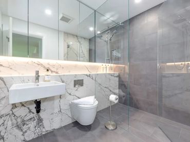 Bathroom renovation with Laminum tile in Whistler BC