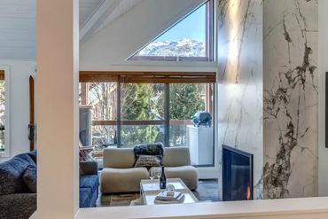 Laminum tile fireplace in a full house renovation in Whistler, BC.