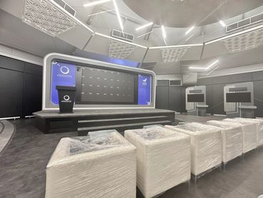 event tent interior in Dubai with stage, big LED screen, and seating setup for innovation showcase.