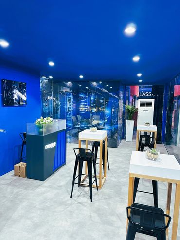 Outdoor exhibition stand in Dubai for Baudouin – bold design showcasing large industrial machines.