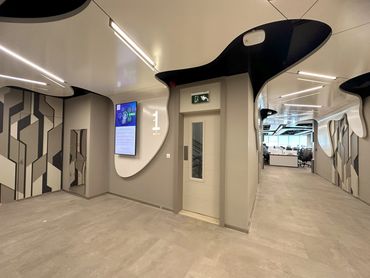 Corporate office interior design in Dubai with modern wall design and office ceiling design