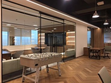 Corporate office interior design in Dubai with ergonomic furniture and modern workspace