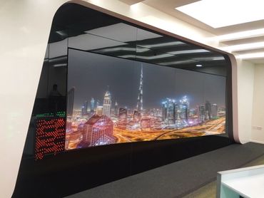 Corporate office interior design in Dubai with modern big led television