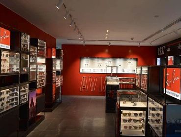 Modern sunglass store interior in Dubai with custom displays and sleek retail design finishes.