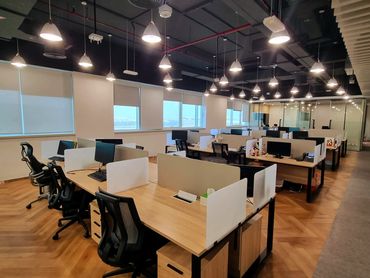 Office interior with glass partition in Dubai – modern design and functional workspace layout.