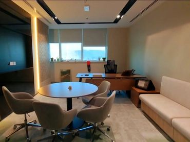 Office interior with glass partition in Dubai – modern design and functional workspace layout.