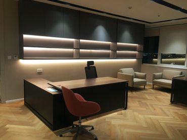 Corporate office interior design in Dubai with ergonomic furniture and modern office table cabinet