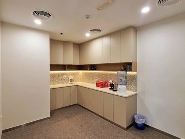 Office interior with in Dubai – modern design of pantry and functional workspace layout.