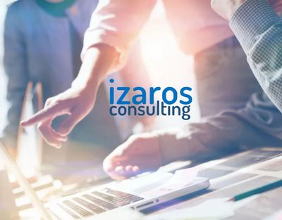 Izaros Marketing Consultants huddled over a computer