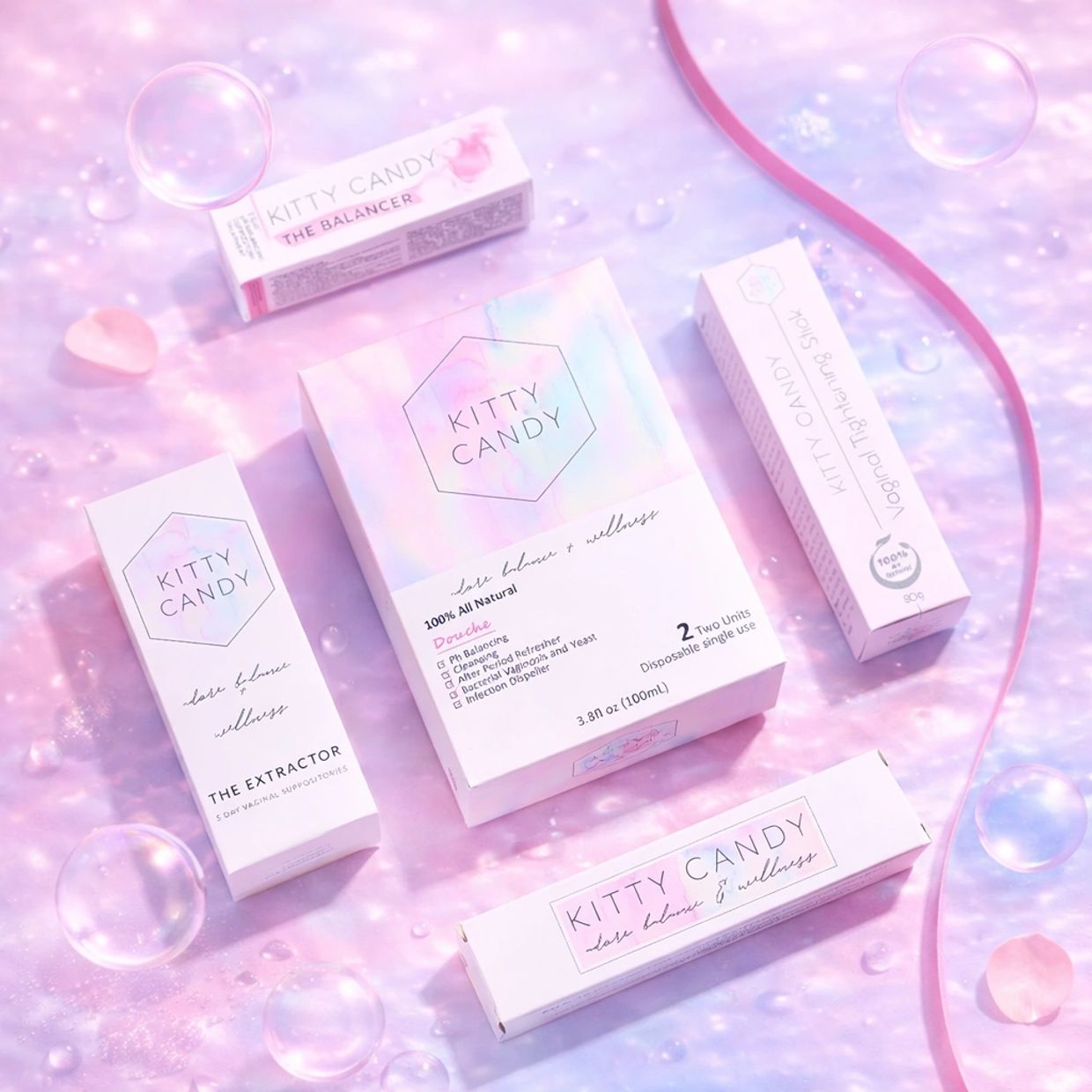 Kitty Candy product packaging on a pastel purple-pink background with bubbles and petals.