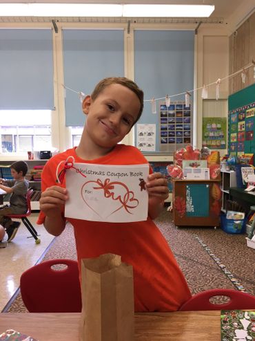 a kid in an orange shirt