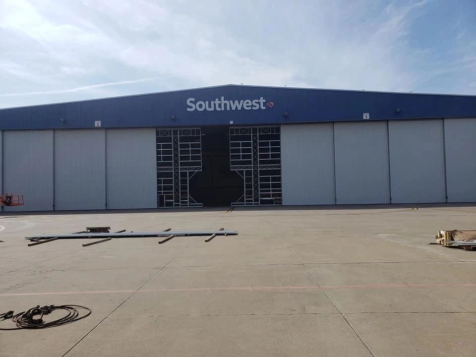 Southwest airline hangar with large closed doors.