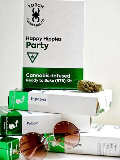 Cannabis-infused baking kits and accessories with sunglasses.