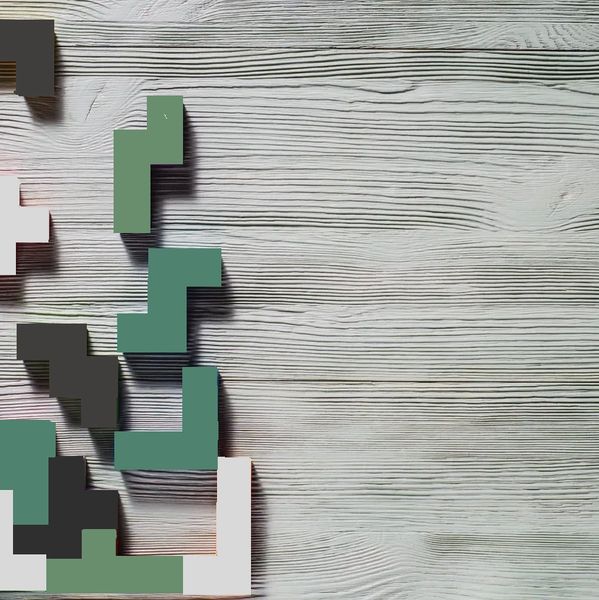 Tetris blocks arranged on a wooden surface with space on the right.