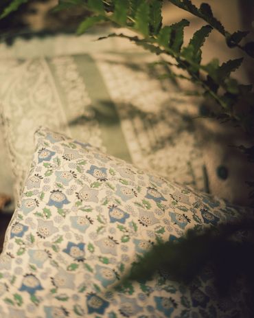 Cushions made with Pam's curtains and tablecloths