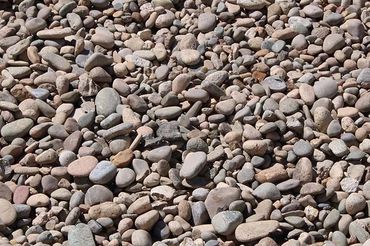 2" River rock. Normally used for landscaping however has countless different uses.