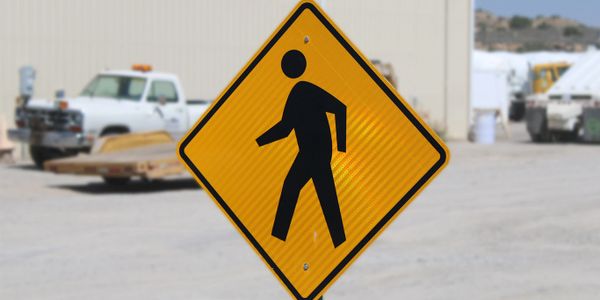 Caution sign for pedestrians.