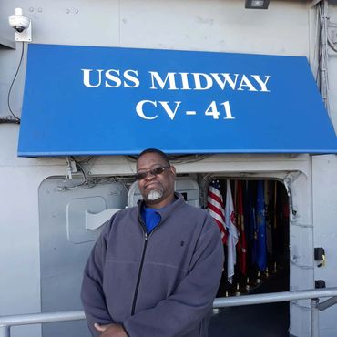 Alvin Toney touring the Naval Ship USS Midway