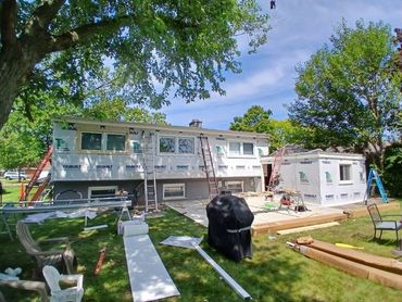 This Bi-level home in Morton Grove, IL got new window wraps/siding by Total Roofing and Construction