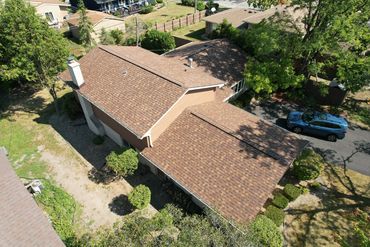 This roof featured shingle color of the year Desert Rose by Owens Corning - 100% covered -Insurance