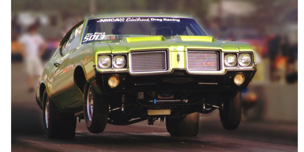 Drag racing using Extreme Mufflers light weight mufflers