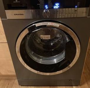 a washing machine on a wash cycle after after an appliance cleaning service