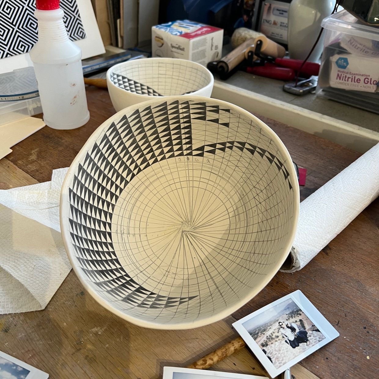 Hand-painted pottery bowls with intricate geometric designs.