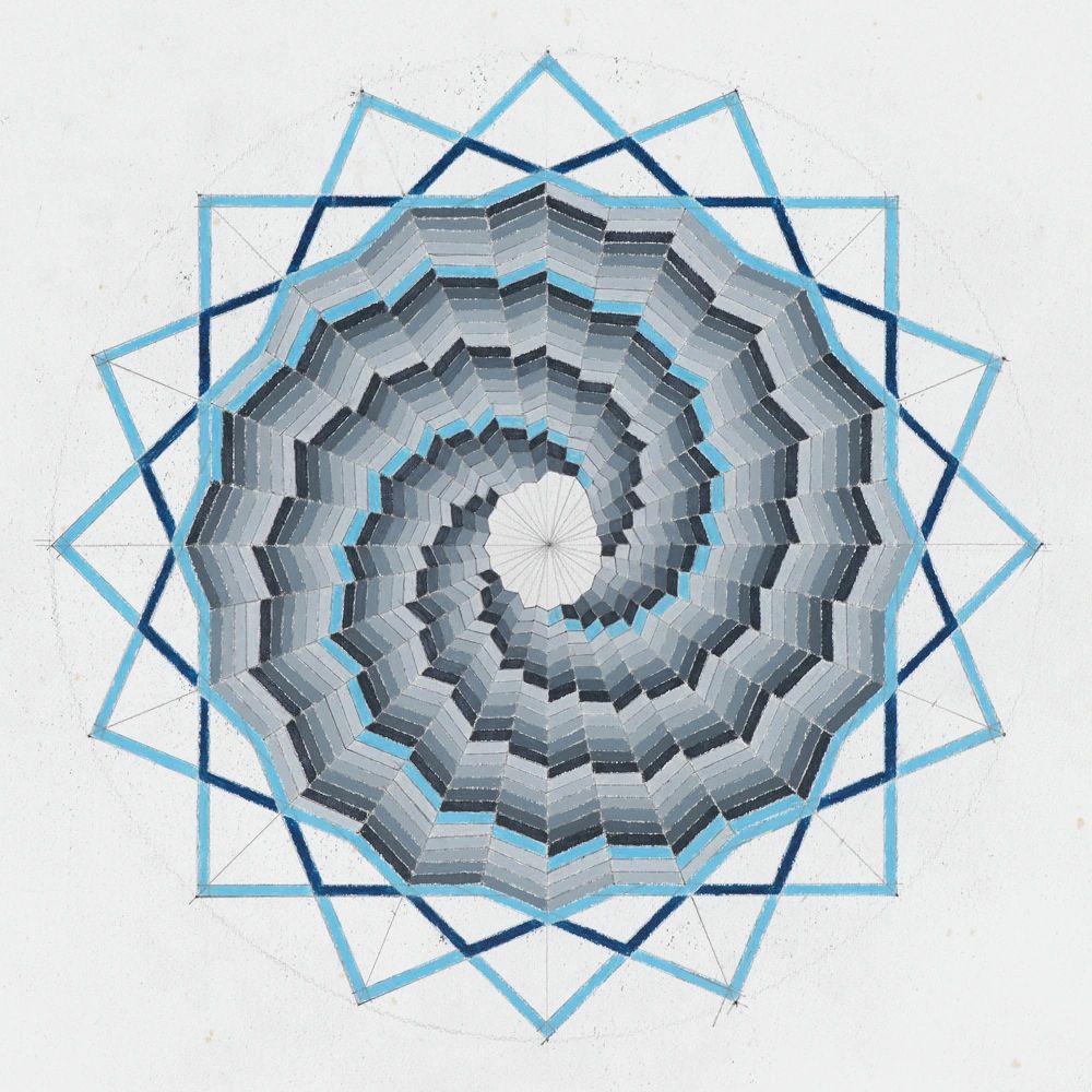 Abstract geometric starburst pattern in shades of blue and gray.