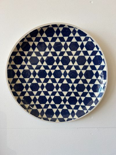 Blue and white geometric patterned plate.