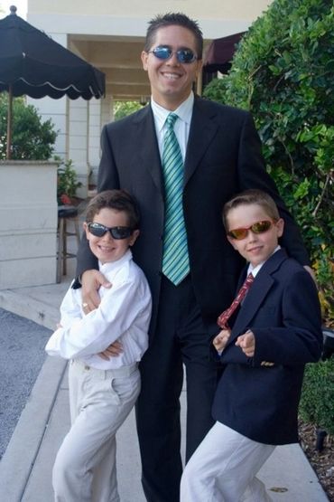 David Remland with his 2 boy Jeremy and Joshua at a wedding 15 years ago.