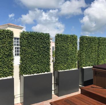 Custom Faux greenery planters for privacy in Key Biscayne, FL.