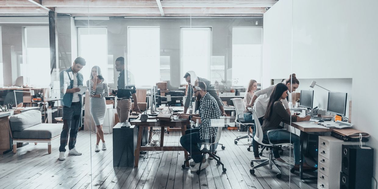 employees working computers phones office network cabling