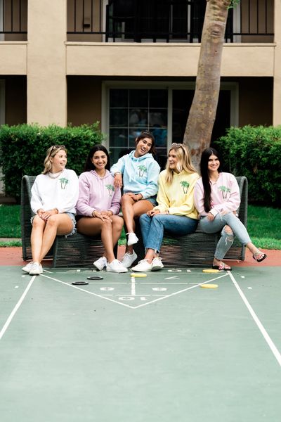 Five key models wearing logo sweatshirts