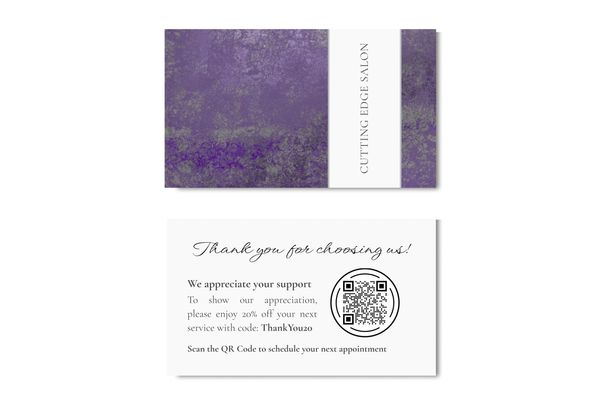 Business card with purple and gray mottled abstract design with some sheen and name of company.