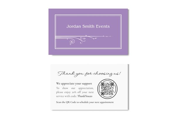 Business card in amethyst color with name of business and art nouveau fleurons.