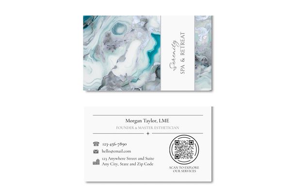 Business card with white, gray and turquoise marbled design and name of company.