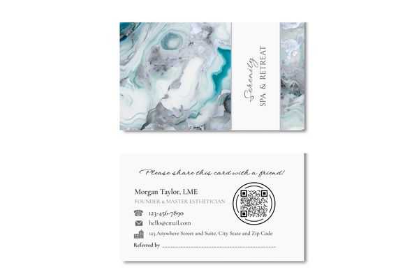 Business card with white, gray and turquoise marbled design and name of company.
