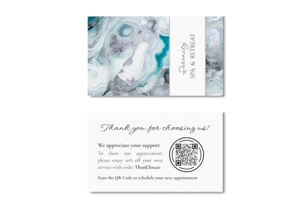 Business card with white, gray and turquoise marbled design and name of company.