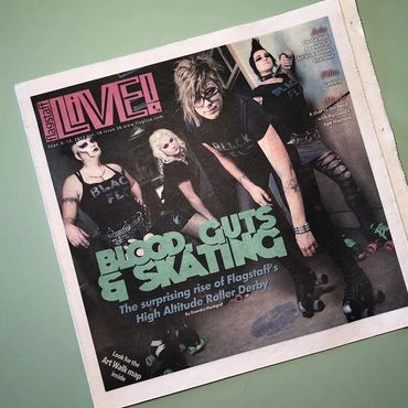A group of roller-skating women on the cover of a magazine.